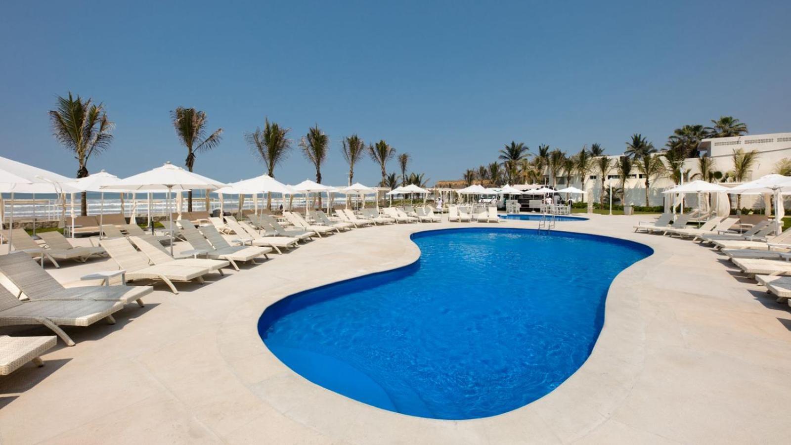 Palacio Mundo Imperial Riviera Diamante Acapulco Exterior foto The swimming pool at the Iberostar Grand Hotel